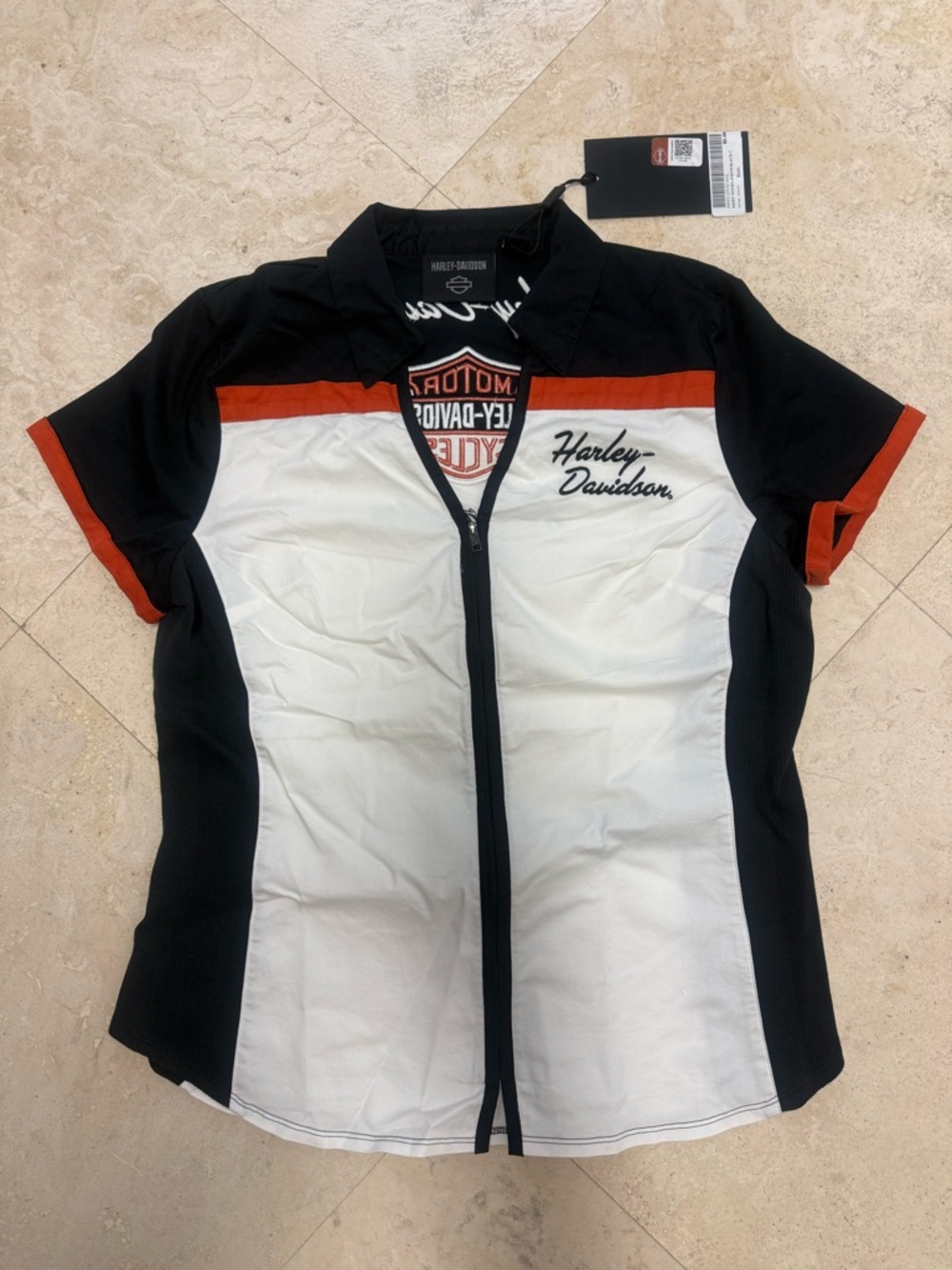 Women’s Harley-Davidson Black, White & Orange Zip-Front Short Sleeve shirt.